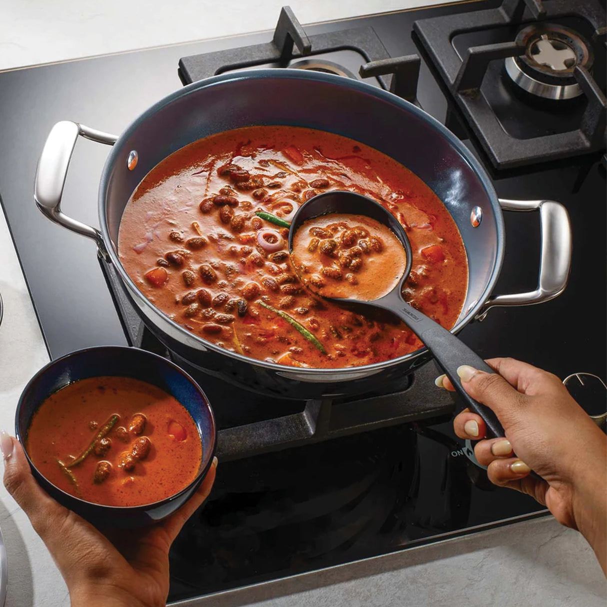 Utsava Tri-Ply Clad Covered Kadai with Ceramic Interior